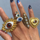 Anillo Laminado de Amuleto con 3 Ojos de Cristal